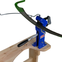 Appareil de SCHWEIGER, appareil pour affûter une lame de faux par broyage.